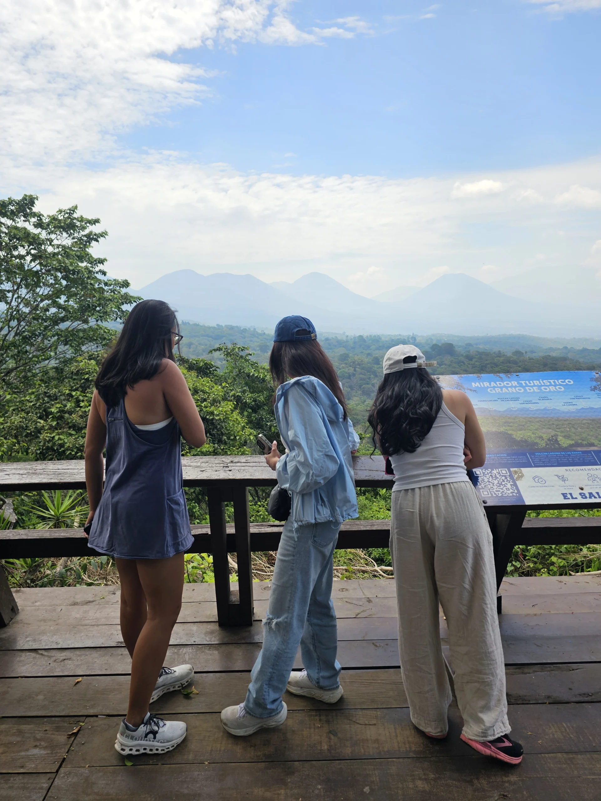 Travelers looking at volcano views in El Salvador